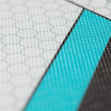 a close up of a textured traction pad on a paddleboard