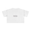 White t-shirt with 'Pau hana Surf Supply' text on a white background