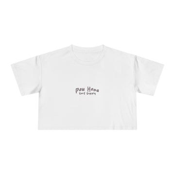 White t-shirt with 'Pau hana Surf Supply' text on a white background