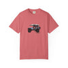 Pink t-shirt with a graphic of a jeep and surfboard on a white background