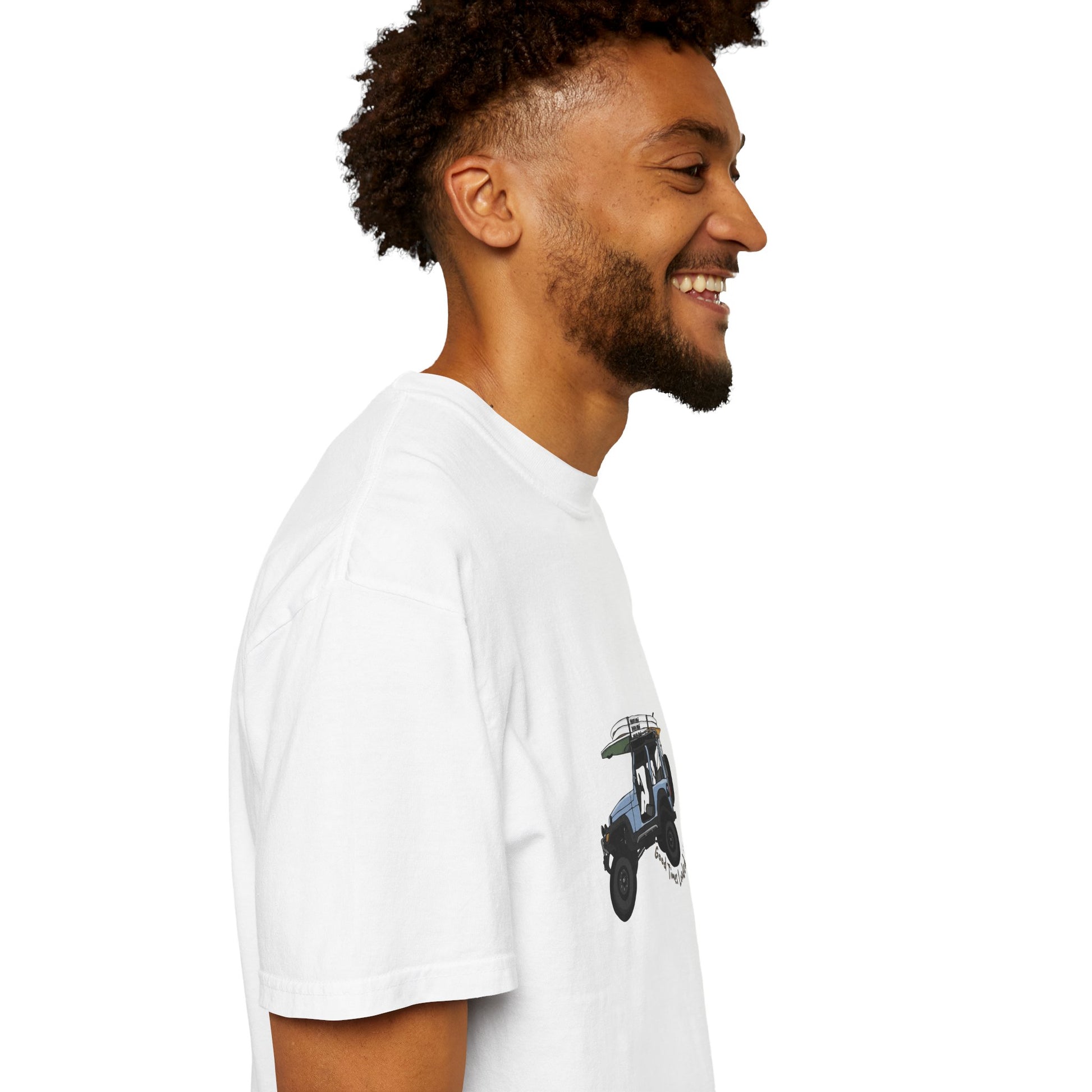 Man wearing a white t-shirt with a graphic design on a white background